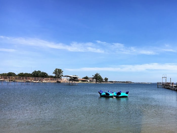 Image of our floating island located on Lake Buchanan in the Heart of the Texas Hill Country. Our family friendly cabin rentals provide the best getaway for small and large groups. Texas cabin rentals