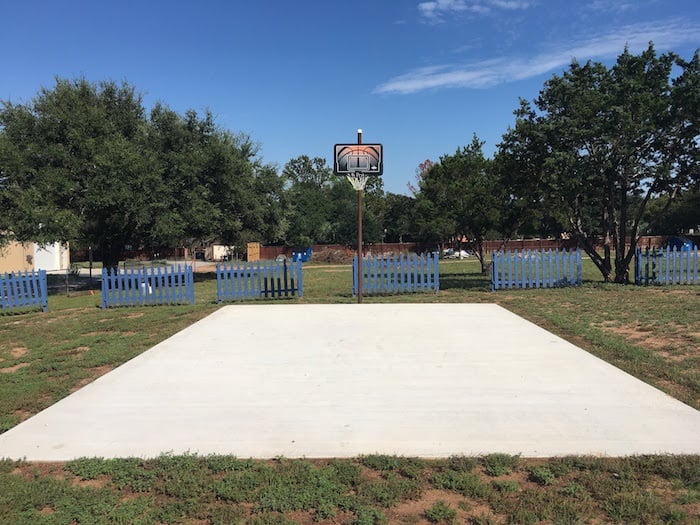 Image of basketball court at our family friendly lake cabin rentals in Texas. Our Texas Hill Country Resort property has plenty of on-site outdoor activities to keep EVERYONE busy! Best cabin rentals in Texas are here at Cedar Lodge.