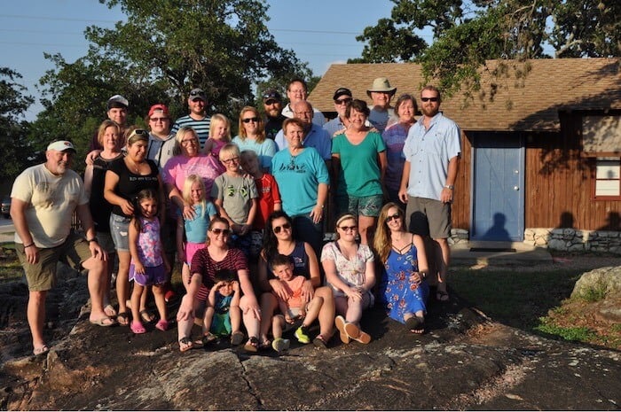 Image of family reunion at Cedar Lodge Texas. Best venue for family reunions in Texas located in the Texas Hill Country. Our lake cabin rentals and gathering halls offer the best accommodations for small and large groups.