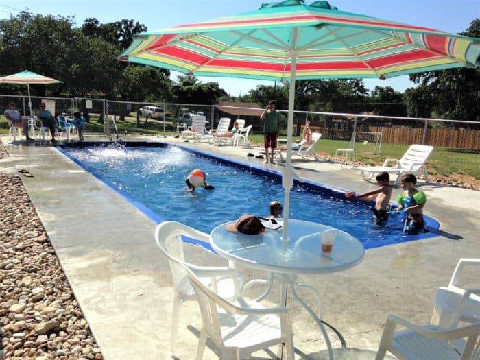 Image of guests using on-site pool at our lake resort in Texas.