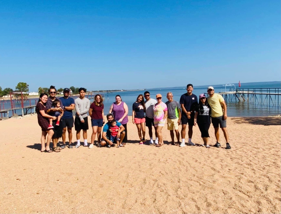 Image of guests at Cedar Lodge Texas' private sandy beachfront