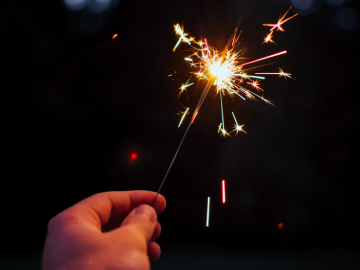 Image of a sparkler. Celebrate New Years' during Covid safely at our family-friendly Texas lake resort