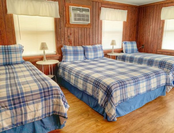 Cabin 22 Interior (One Queen Bed and 2 Single Beds)
